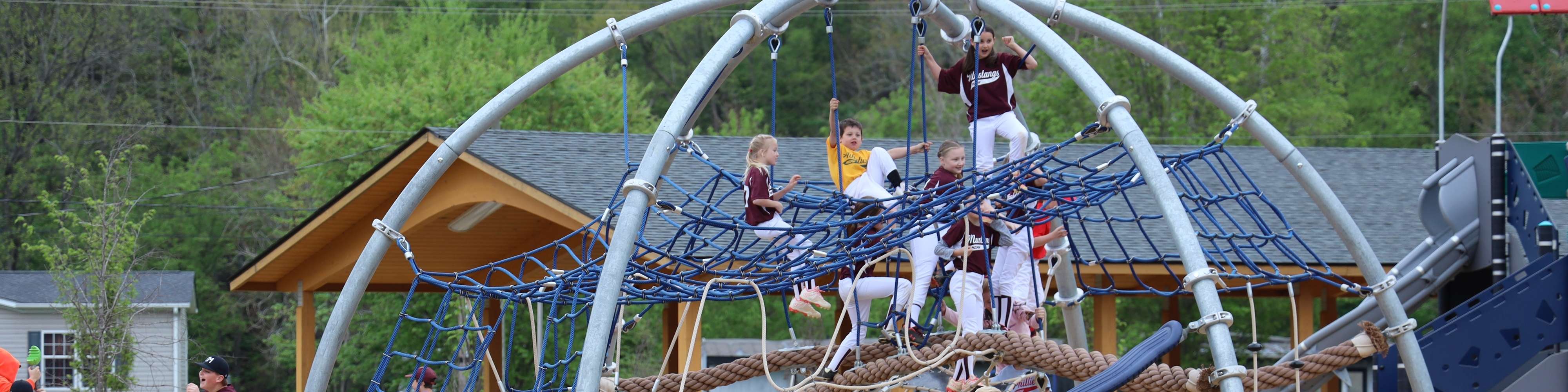 Children on the playground at Creed Fields Park