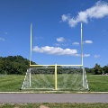 Multipurpose field with soccer and football goals.