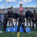 Sheriff's Office personnel with Special Olympics participant.